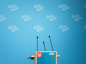 The empty speakers’ desk with the logo of Germany’s far-right Alternative for Germany (AfD)