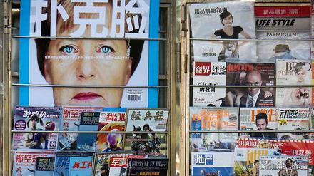 Titelheldin. Auf diesem chinesischen Magazincover von 2011 wird Angela Merkel als "Pokerface" bezeichnet.
