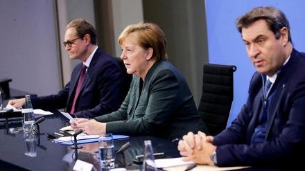 Nach dem Coronarat: Michael Müller, Angela Merkel und Markus Söder