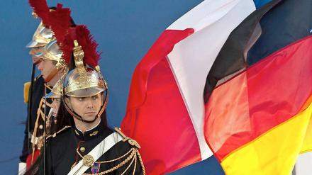 Frankreich und Deutschland galten bisher als stärkste Wirtschaftsmächte der Euro-Zone. Nach der Herabstufung der Kreditwürdigkeit Frankreichs bleibt Deutschland allein an der Spitze zurück.