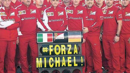 Gruß aus Jerez. In Spanien finden derzeit die Testfahrten der Formel-1-Piloten mit ihren neuen Autos statt. Das Ferrari-Team hofft mit Michael Schumacher. Foto: Roman Rios/dpa
