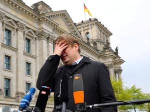 Maximilian Krah, member of the European Parliament for the far-right Alternative for Germany and AfD's top candidate in June's election to the assembly, gives a statement, after an aide has been arrested in Germany on suspicion of "especially severe" espionage for China, in Berlin, Germany, April 24, 2024.   REUTERS/Fabrizio Bensch