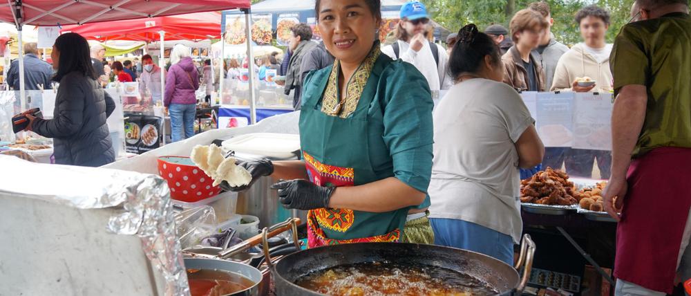 Thai Park im Preußenpark. Hier kochen Thais auf einem Streetfoodmarkt.