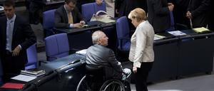 Wolfgang Schäuble und Angela Merkel im Juni 2013 im Bundestag.