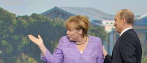 Kanzlerin Angela Merkel und Präsident Wladimir Putin. 