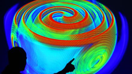 Eine Computersimulation der Ausbreitung von Gravitationswellen am Max-Planck-Institut für Gravitationsphysik in Potsdam. Durch die Messung der Wellen lassen sich heute Rückschlüsse auf Vorgänge in den Weiten des Universums schließen - bis zu vielen Milliarden von Jahren zurück.