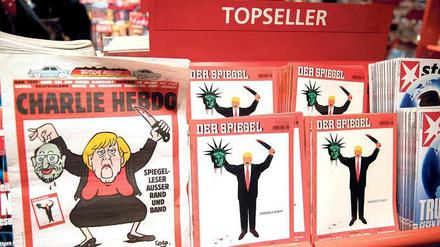 Schlachteplatte. Die aktuellen Cover von „Charlie Hebdo“ (links) und „Spiegel“.