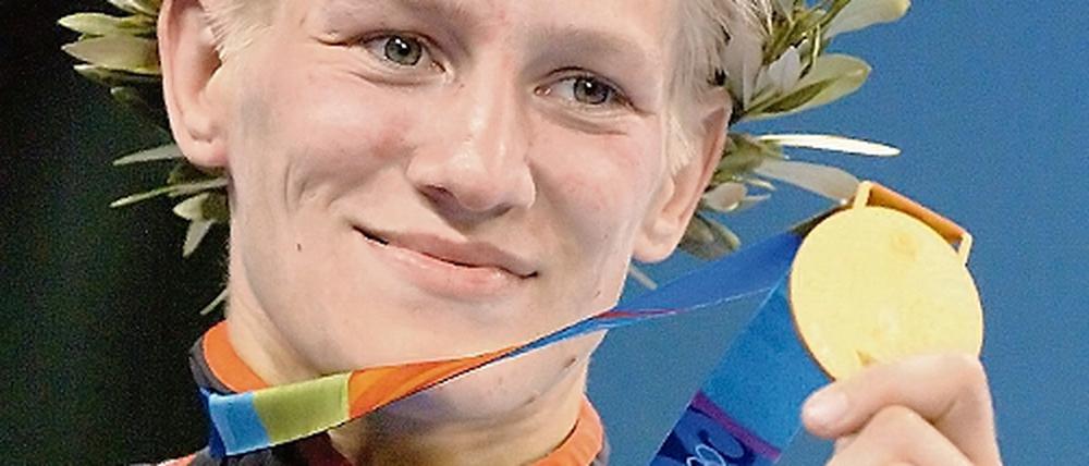 Ihr bisher schönster Tag. Yvonne Bönisch nach ihrem Olympiasieg 2004.