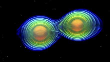 Dieses Bild zeigt eine Simulation zweier einander umkreisender und verschmelzender Neutronensterne.